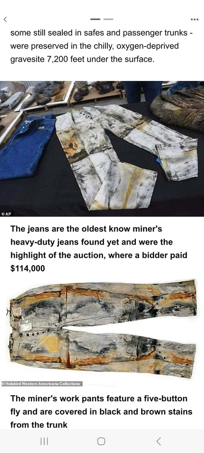 Phone screenshot of a news article on the oldest known miner's jeans, stained black and brown, from an auction