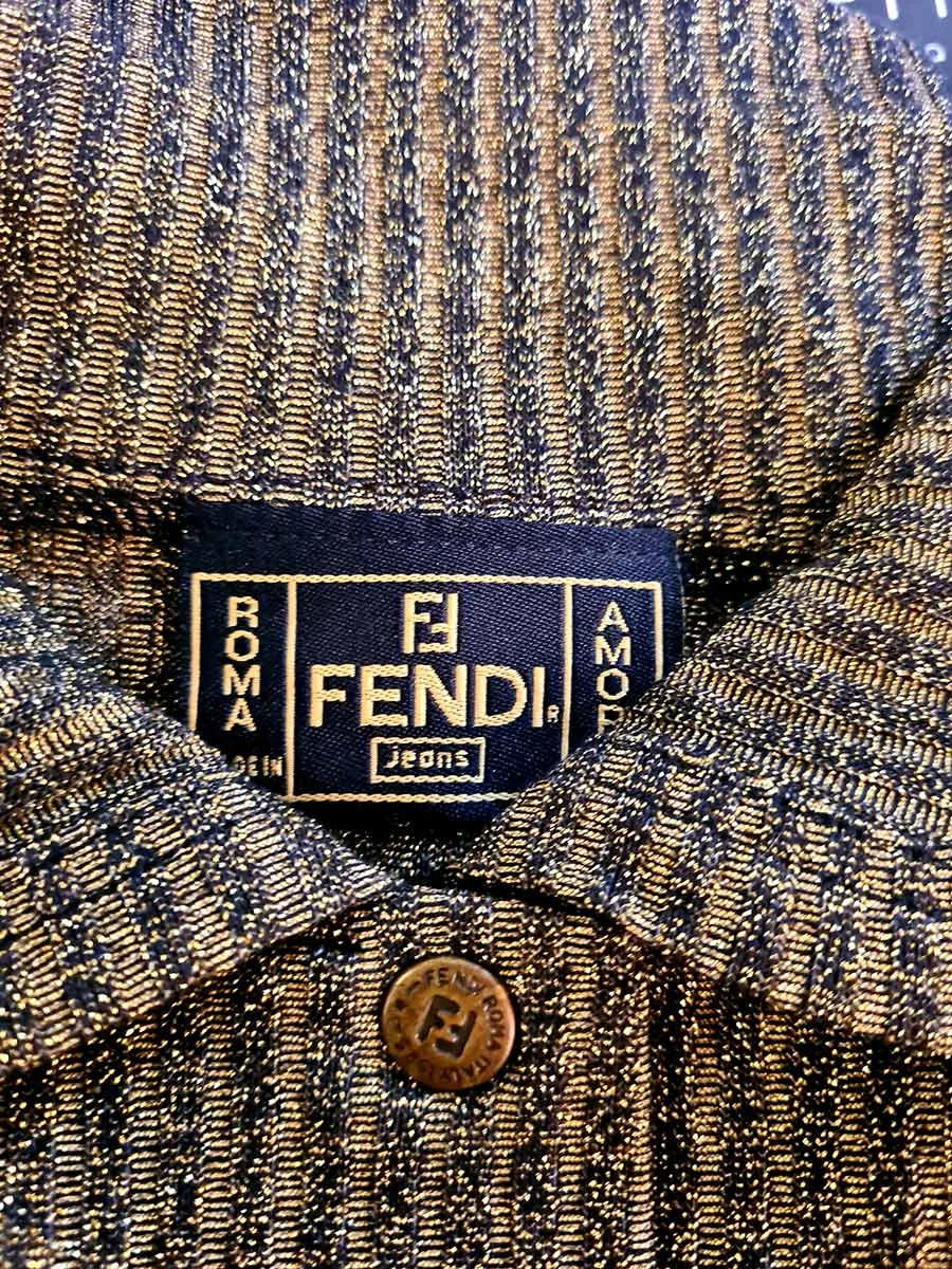 Gold and black metallic knit top with a Fendi Jeans label and a Fendi logo button at the collar