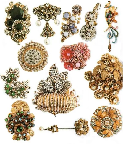 Collection of Miriam Haskell vintage brooches and a hatpin in pearls, beads, rhinestones and gilt flowers