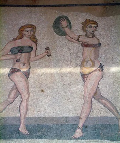 Roman mosaic of two women in bikini-style two-pieces, one holding dumbbells and the other a disc