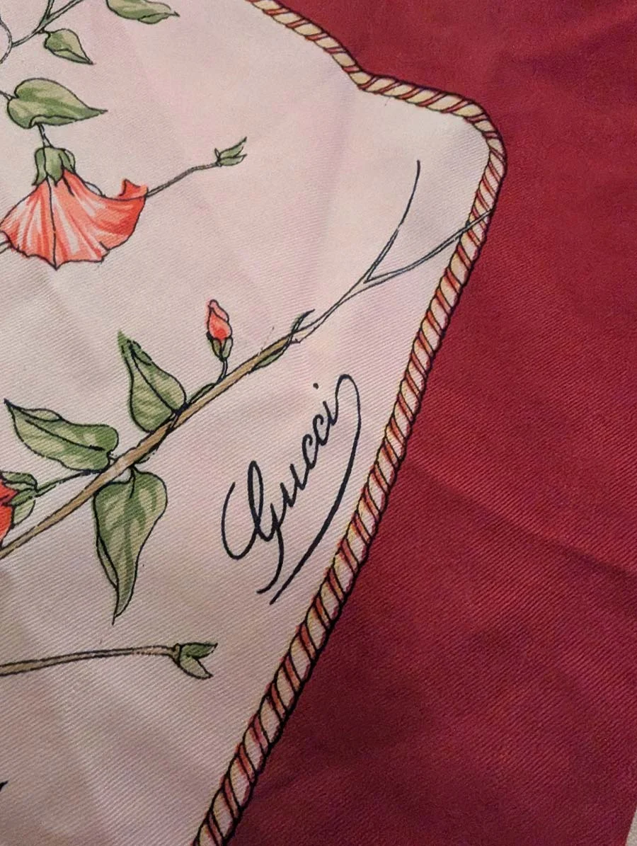 Vintage Gucci silk scarf with a burgundy border, rope-twist trim and a spray of pink flowers