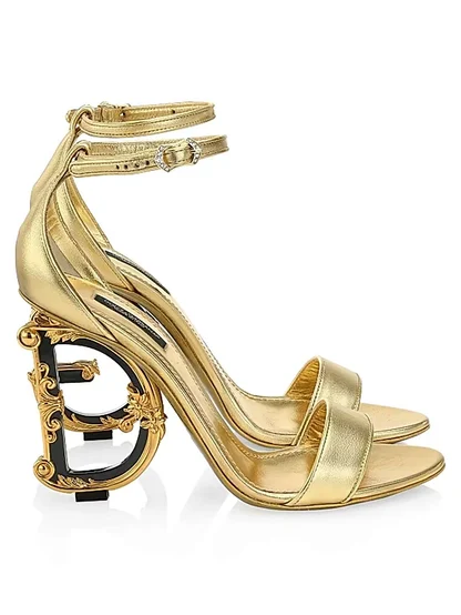 Gold metallic leather Dolce & Gabbana sandals with an ankle strap and a sculpted baroque DG heel
