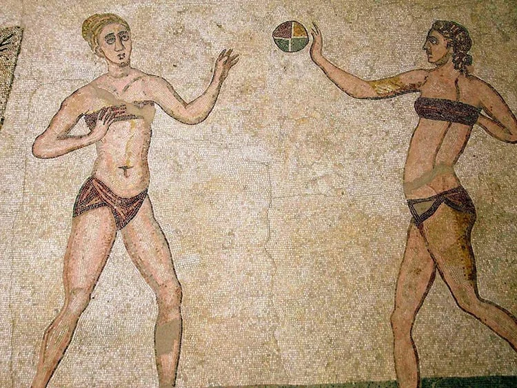 Roman mosaic from the villa near Piazza Armerina, Sicily, of two women in bikini-style outfits playing with a ball